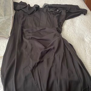Corset style black dress with small slit on side